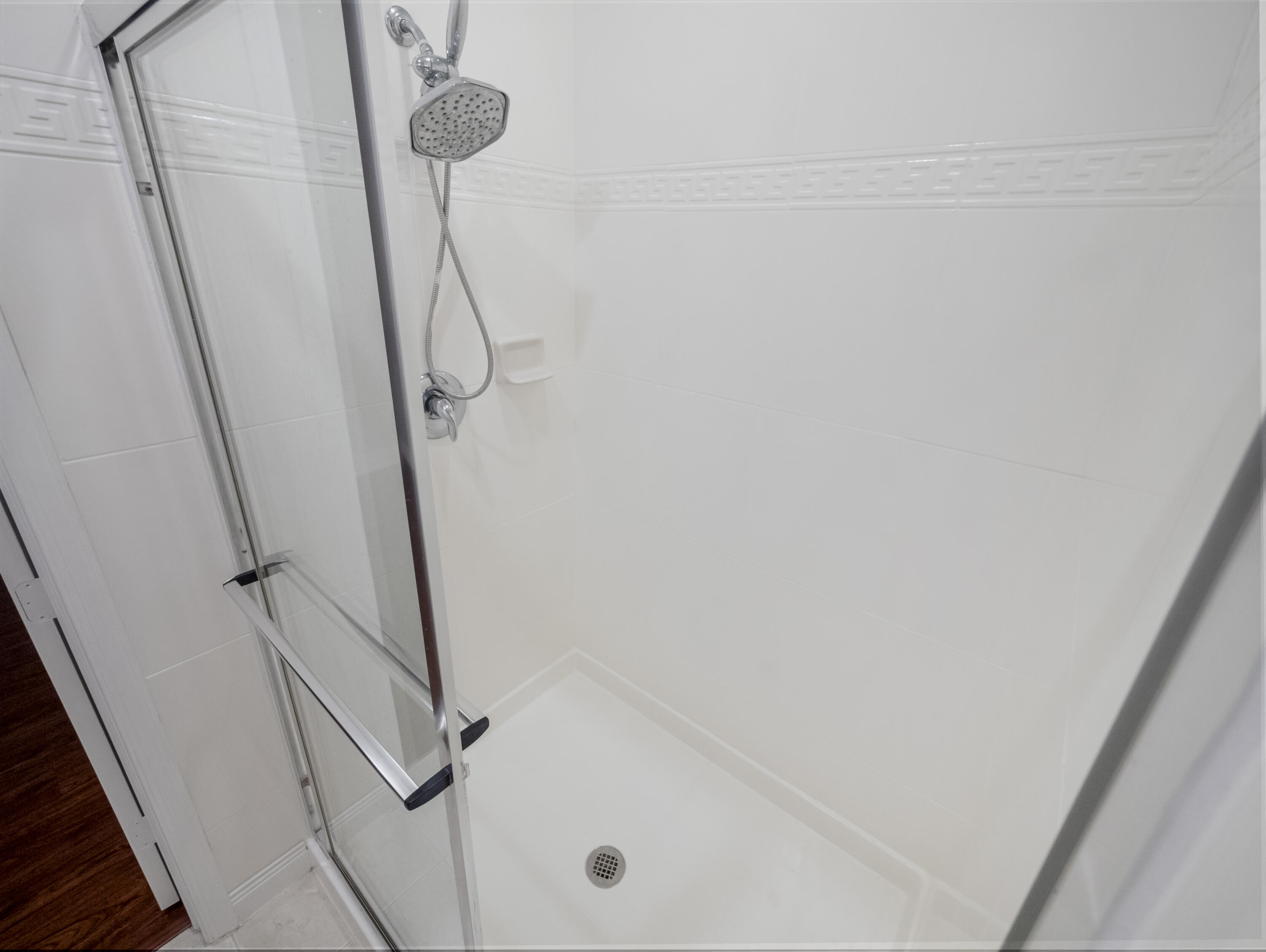 148 Morning Dew Circle Jupiter, FL 33458 - Photo 15 of 21 a bathroom with a shower
