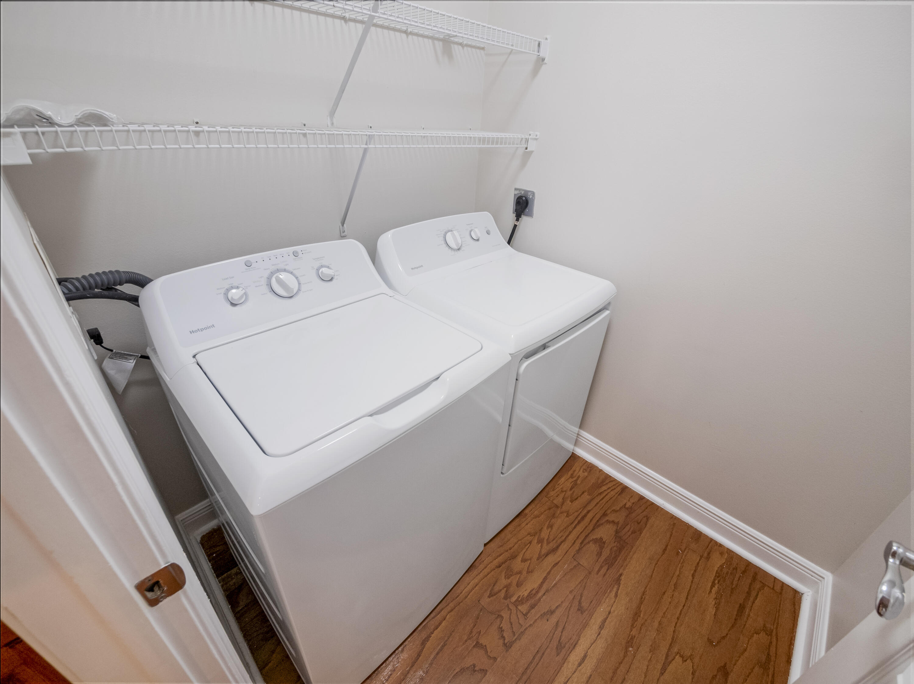 148 Morning Dew Circle Jupiter, FL 33458 - Photo 8 of 21 a utility room with dryer and washer