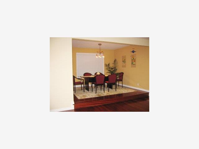 2321 Oak Flat Road San Jose, CA 95131 - Photo 3 of 9 a living room with furniture and a large window