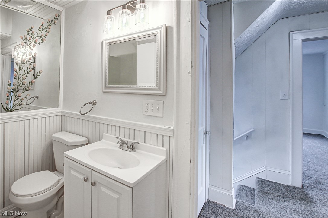 4764 Rockwood Road Cleveland, OH 44125 - Photo 20 of 35 Bathroom with toilet and vanity
