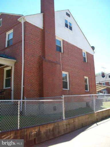 2015 Winford Road Baltimore, MD 21239 - Photo 15 of 22 a view of a brick building with many windows