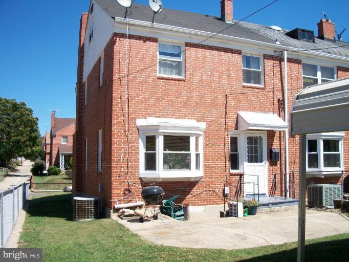 2015 Winford Road Baltimore, MD 21239 - Photo 16 of 22 a front view of a house with outdoor seating