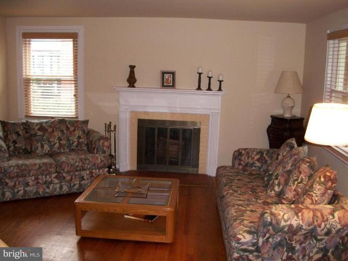 2015 Winford Road Baltimore, MD 21239 - Photo 3 of 22 a living room with furniture and a fireplace