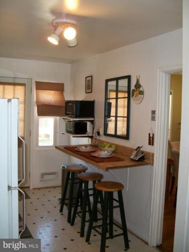 2015 Winford Road Baltimore, MD 21239 - Photo 7 of 22 a view of a dining room with furniture