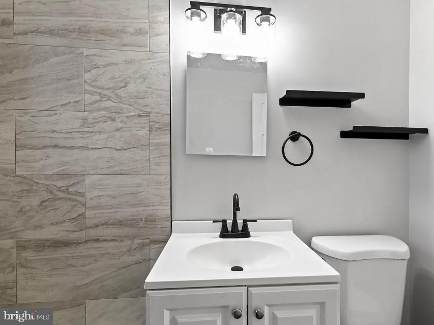 2809 A 16th Road South, Unit 2809A Arlington, VA 22204 - Photo 12 of 13 a bathroom with a sink and a toilet