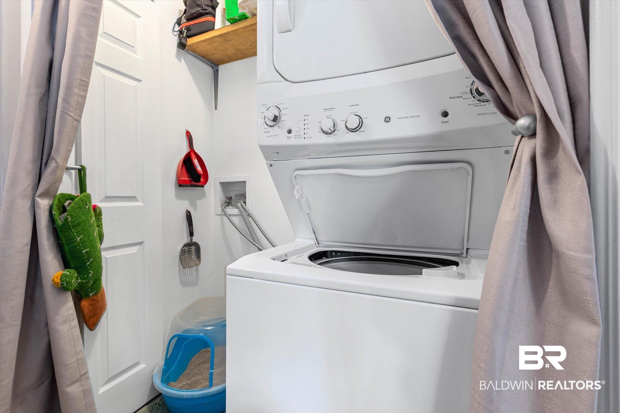 14165 River Oaks Road, Unit A & B Coden, AL 36523 - Photo 18 of 35 Laundry area with stacked washer / drying machine