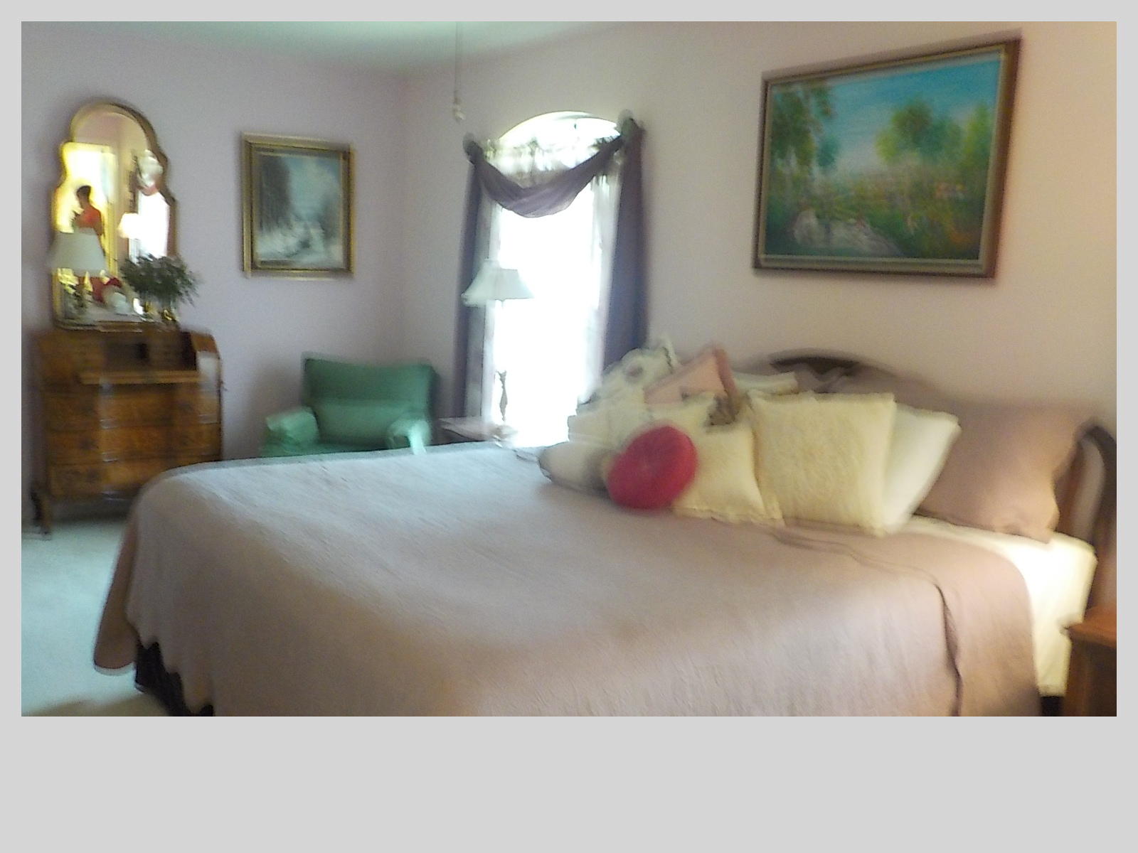 2159 Southeast Erwin Road Port St. Lucie, FL 34952 - Photo 22 of 48 a bedroom with a bed and a painting on the wall