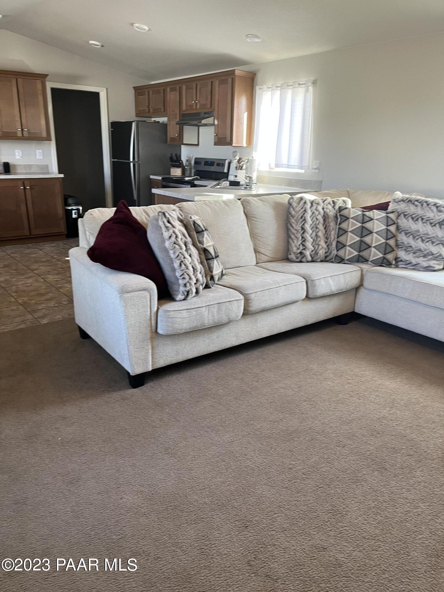 61 Antelope Run Road Paulden, AZ 86334 - Photo 12 of 29 a living room with furniture and a couch