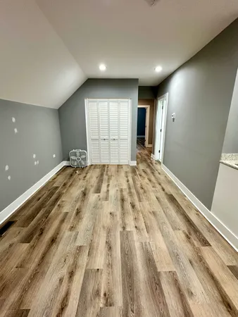 a view of an empty room and window