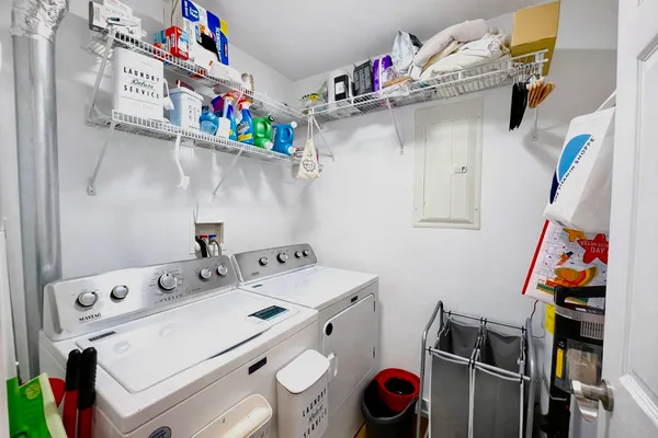 a utility room with dryer and washer