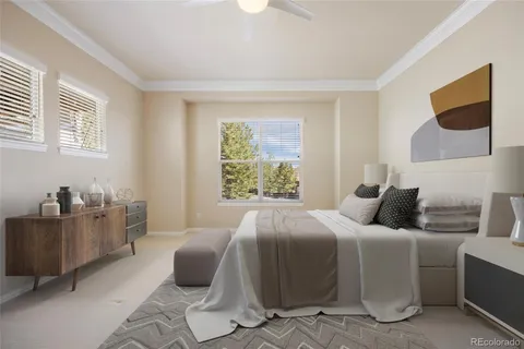 a bedroom with a bed and dresser