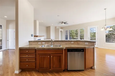 a kitchen with a stove and a sink