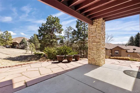 a view of a backyard of the house