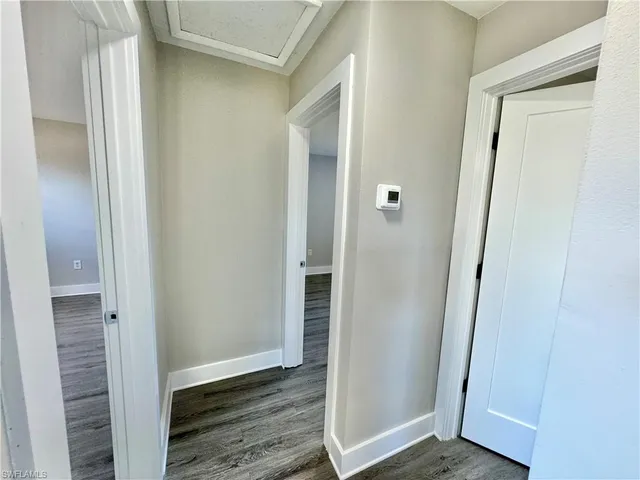 a view of a bathroom with wooden floor