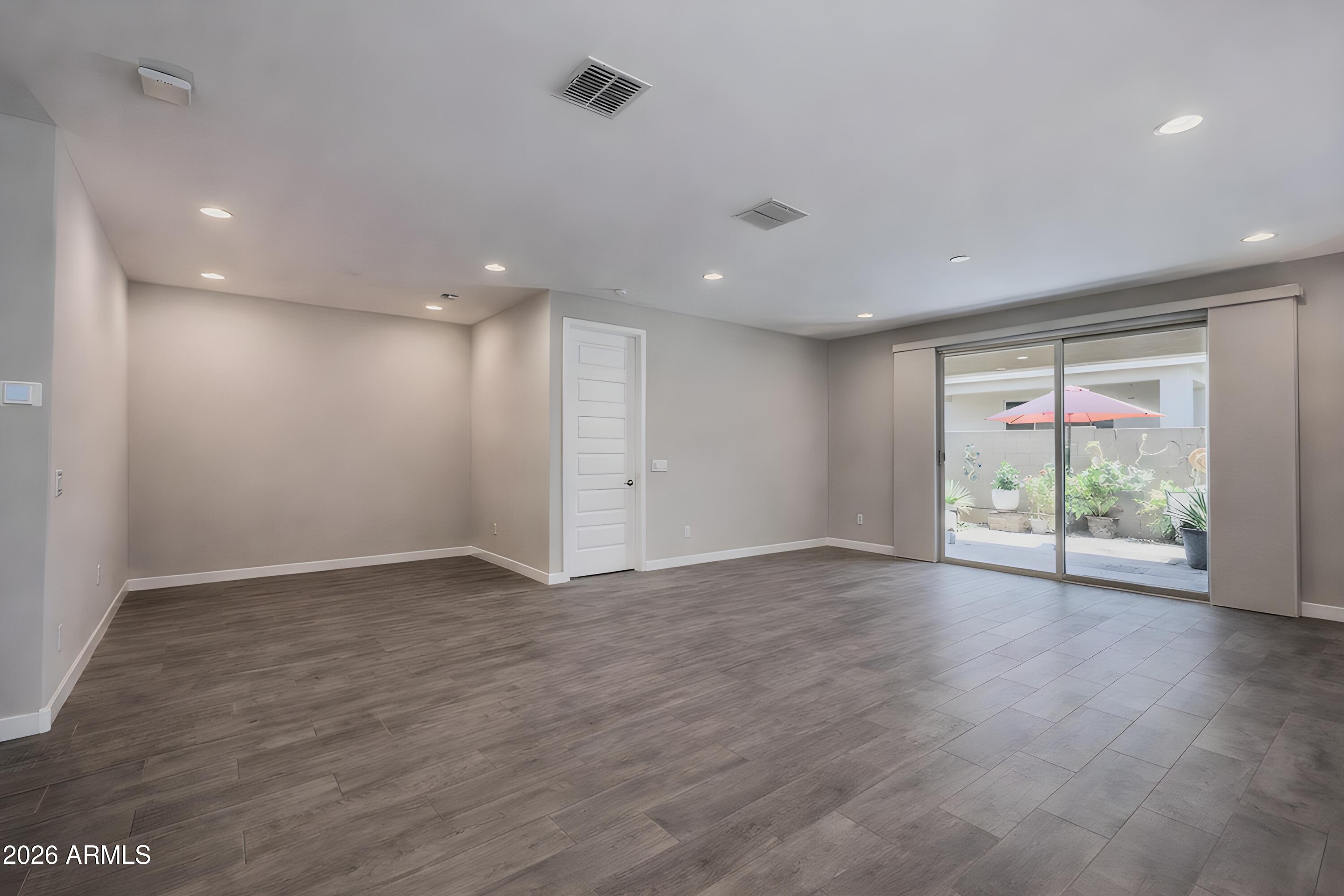 17219 West La Luz Road Surprise, AZ 85387 - Photo 16 of 46 Den + Living Room + Back Patio