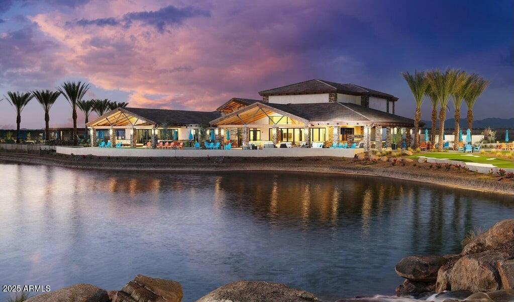 17219 West La Luz Road Surprise, AZ 85387 - Photo 43 of 46 049 Evening view of clubhouse at Asante