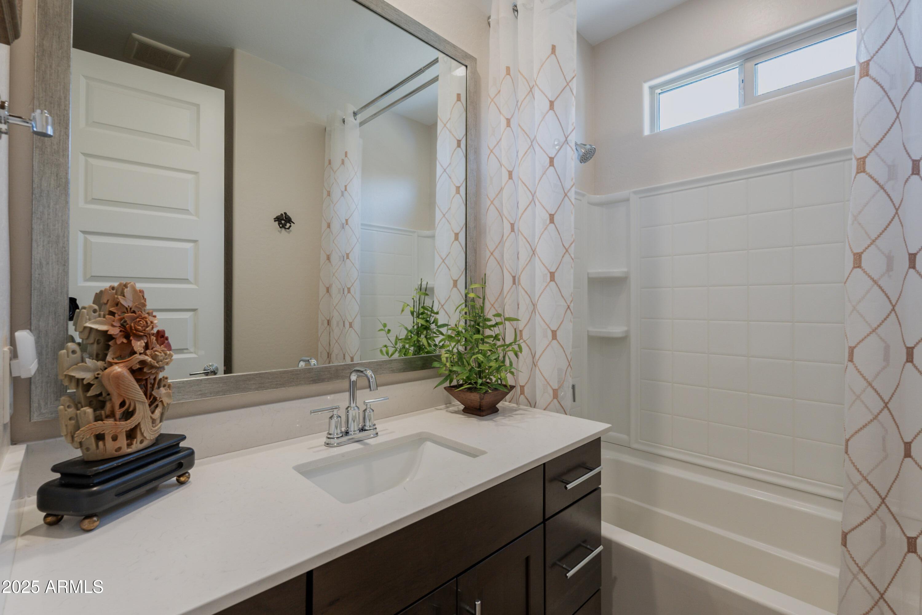 17219 West La Luz Road Surprise, AZ 85387 - Photo 7 of 46 012 Guest Bath 17219 W La Luz Rd