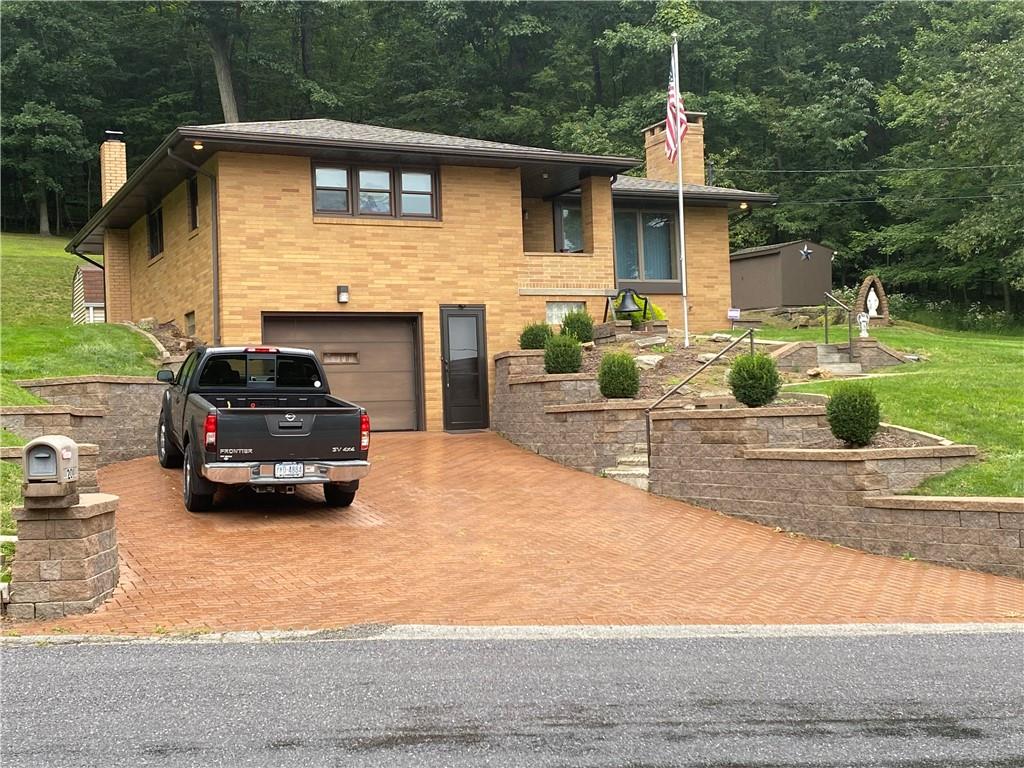 201 College Lodge Road Indiana, PA 15701 - Photo 2 of 20 a car parked in front of a house