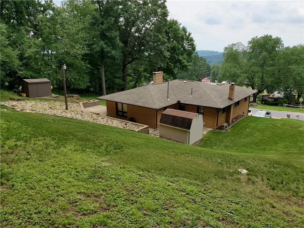 201 College Lodge Road Indiana, PA 15701 - Photo 20 of 20 an aerial view of a house having patio with a garden