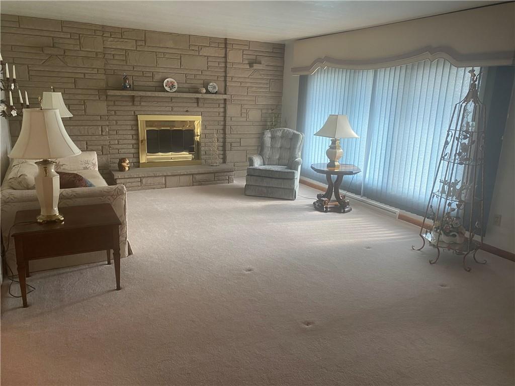 201 College Lodge Road Indiana, PA 15701 - Photo 4 of 20 a living room with furniture and a fireplace