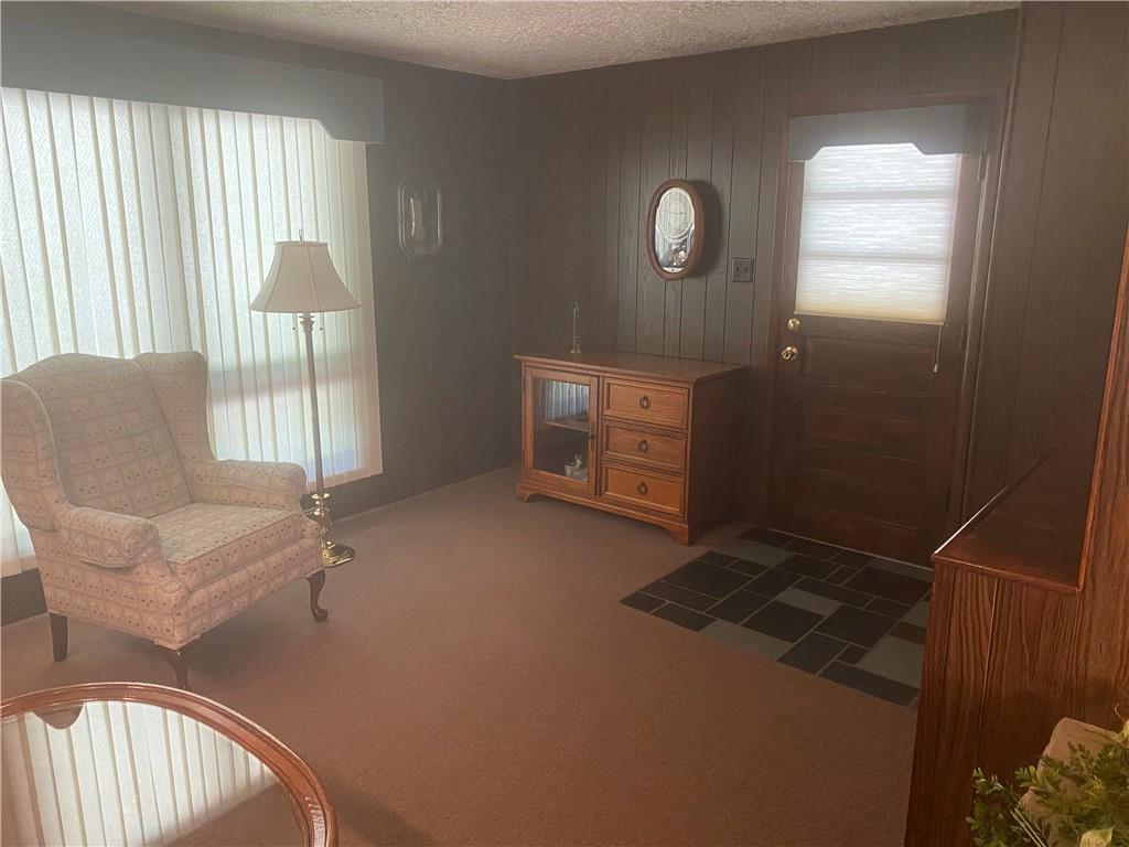 201 College Lodge Road Indiana, PA 15701 - Photo 7 of 20 a living room with furniture and a window