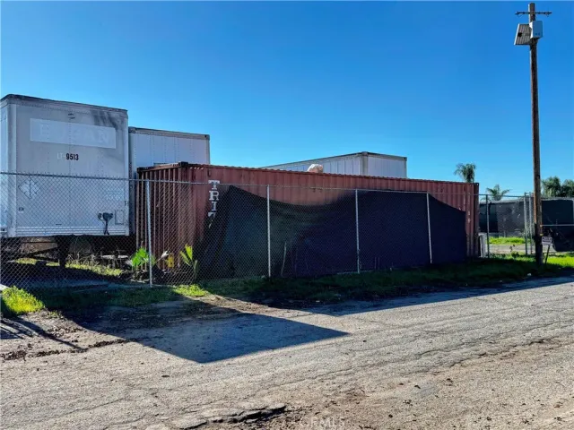 a view of a backyard of the house