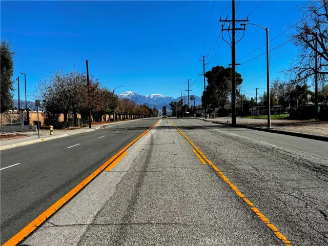 a view of a swimming pool with a yard