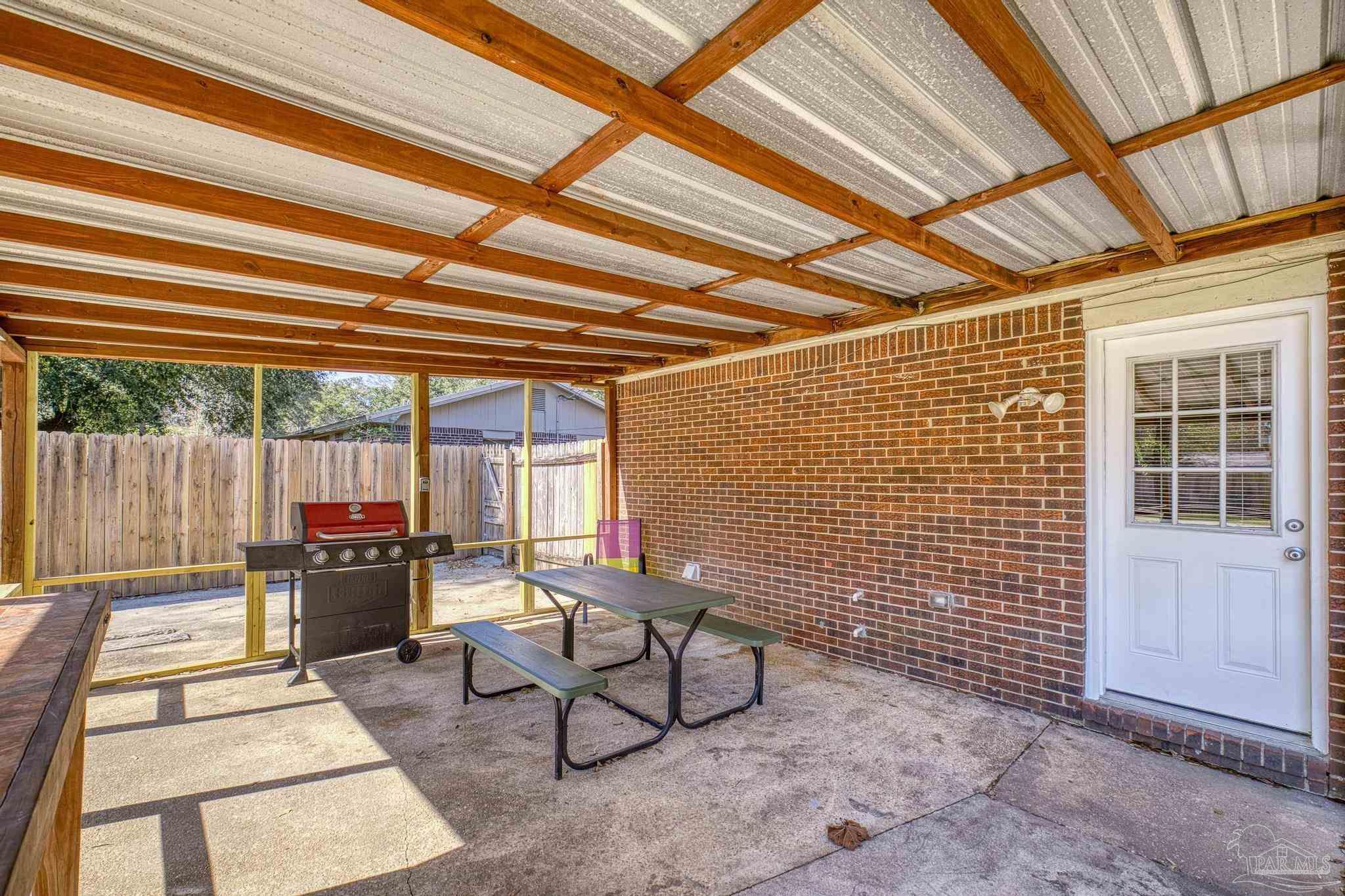 5247 Catalina Street Pace, FL 32571 - Photo 26 of 44 framed for screened porch