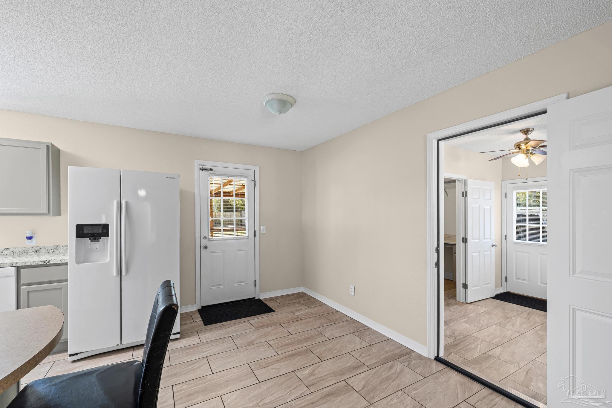 5247 Catalina Street Pace, FL 32571 - Photo 9 of 44 door to back patio plus door to bonus room