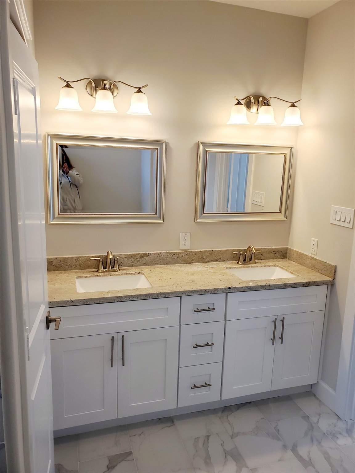720 C Link Road Houston, TX 77009 - Photo 26 of 40 a bathroom with double sink and a large mirror