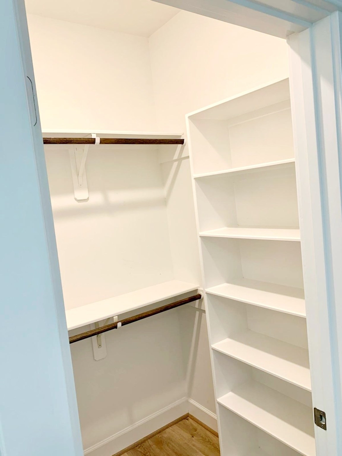 720 C Link Road Houston, TX 77009 - Photo 33 of 40 a view of walk in closet with empty racks