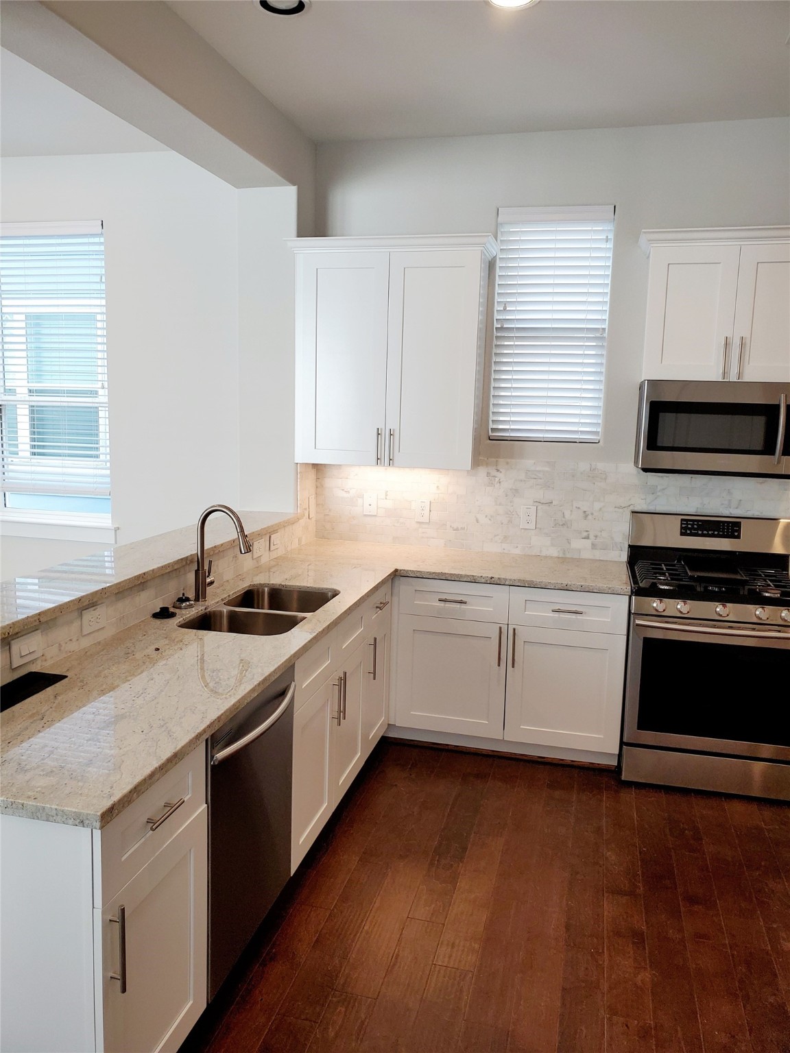 720 C Link Road Houston, TX 77009 - Photo 6 of 40 a kitchen that has a sink and a stove
