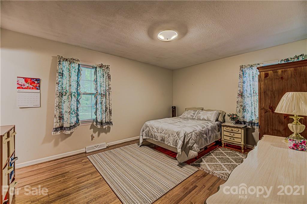 11328 Torino Road Matthews, NC 28105 - Photo 13 of 23 a bedroom with a bed and a window