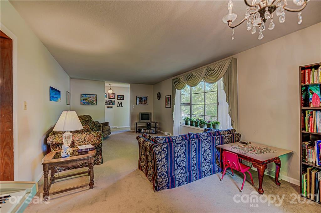 11328 Torino Road Matthews, NC 28105 - Photo 4 of 23 a living room with furniture and a large window