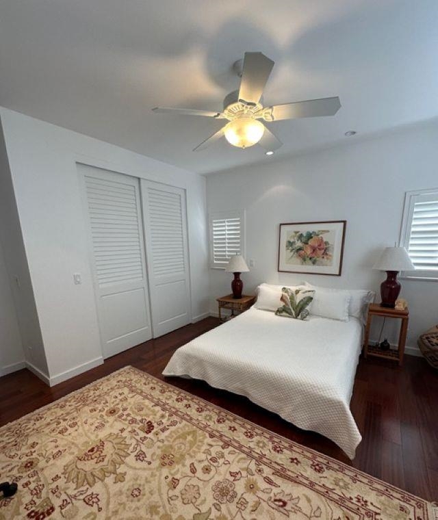 1141 Lower Kimo Drive Kula, HI 96790 - Photo 21 of 34 a bedroom with a bed and a chandelier