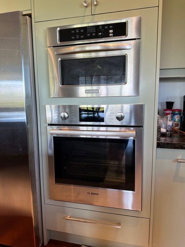1141 Lower Kimo Drive Kula, HI 96790 - Photo 7 of 34 a stove top oven sitting inside of a kitchen