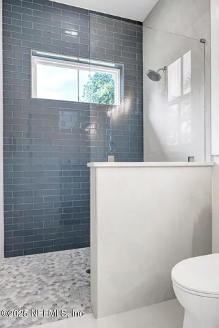 a bathroom with a toilet