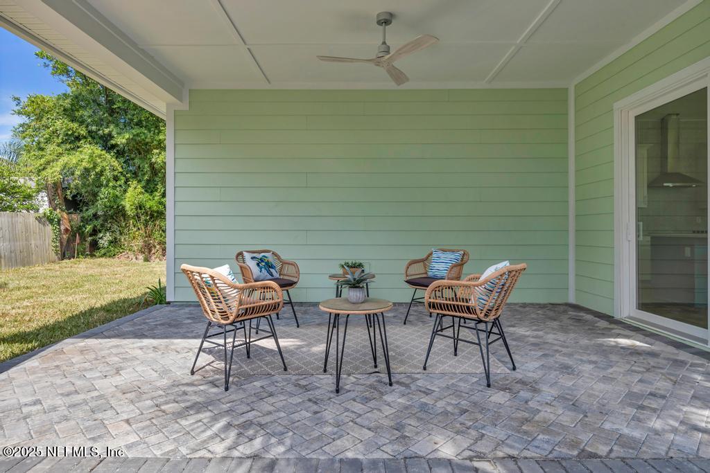 552 Seagate Avenue Neptune Beach, FL 32266 - Photo 27 of 29 a couple of chairs sitting in backyard of house