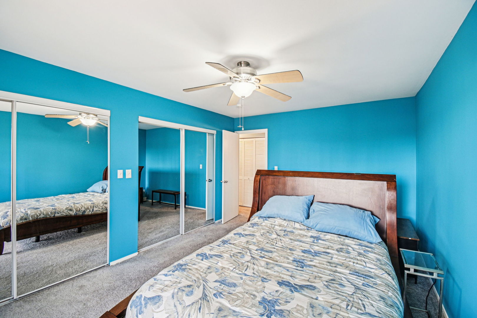 67 Woodhills Bay Road Fox Lake, IL 60020 - Photo 13 of 27 a bedroom with a bed and a walk in closet