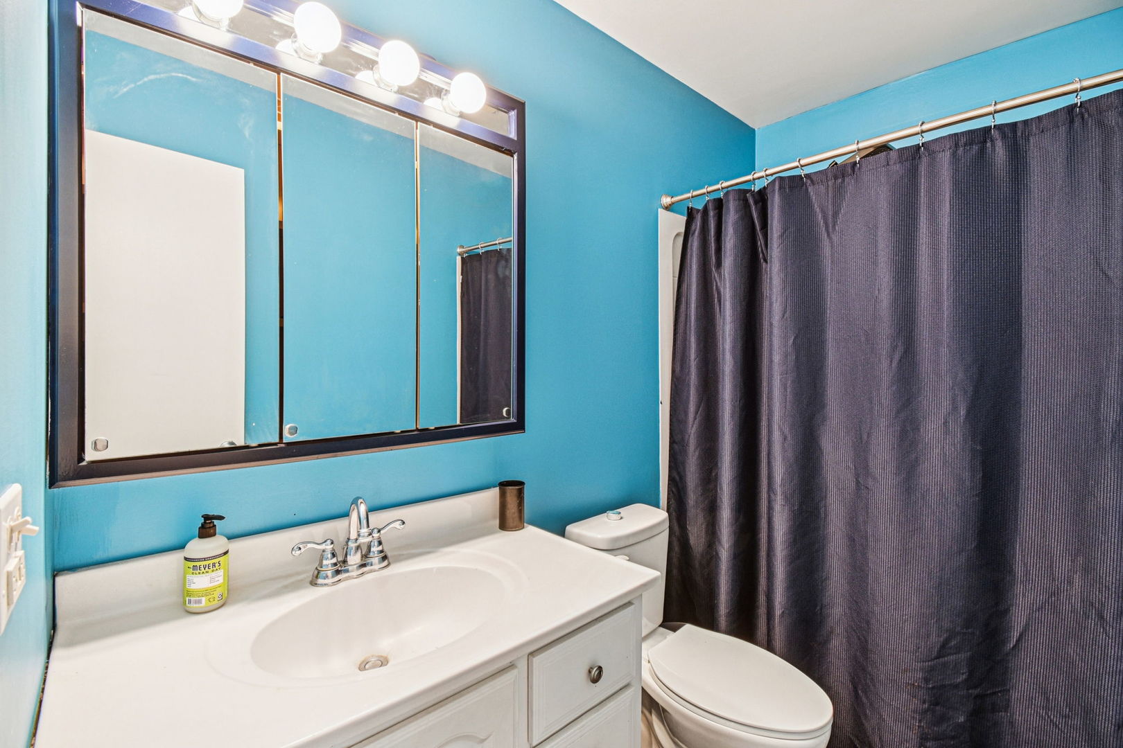 67 Woodhills Bay Road Fox Lake, IL 60020 - Photo 14 of 27 a bathroom with a sink a toilet and mirror
