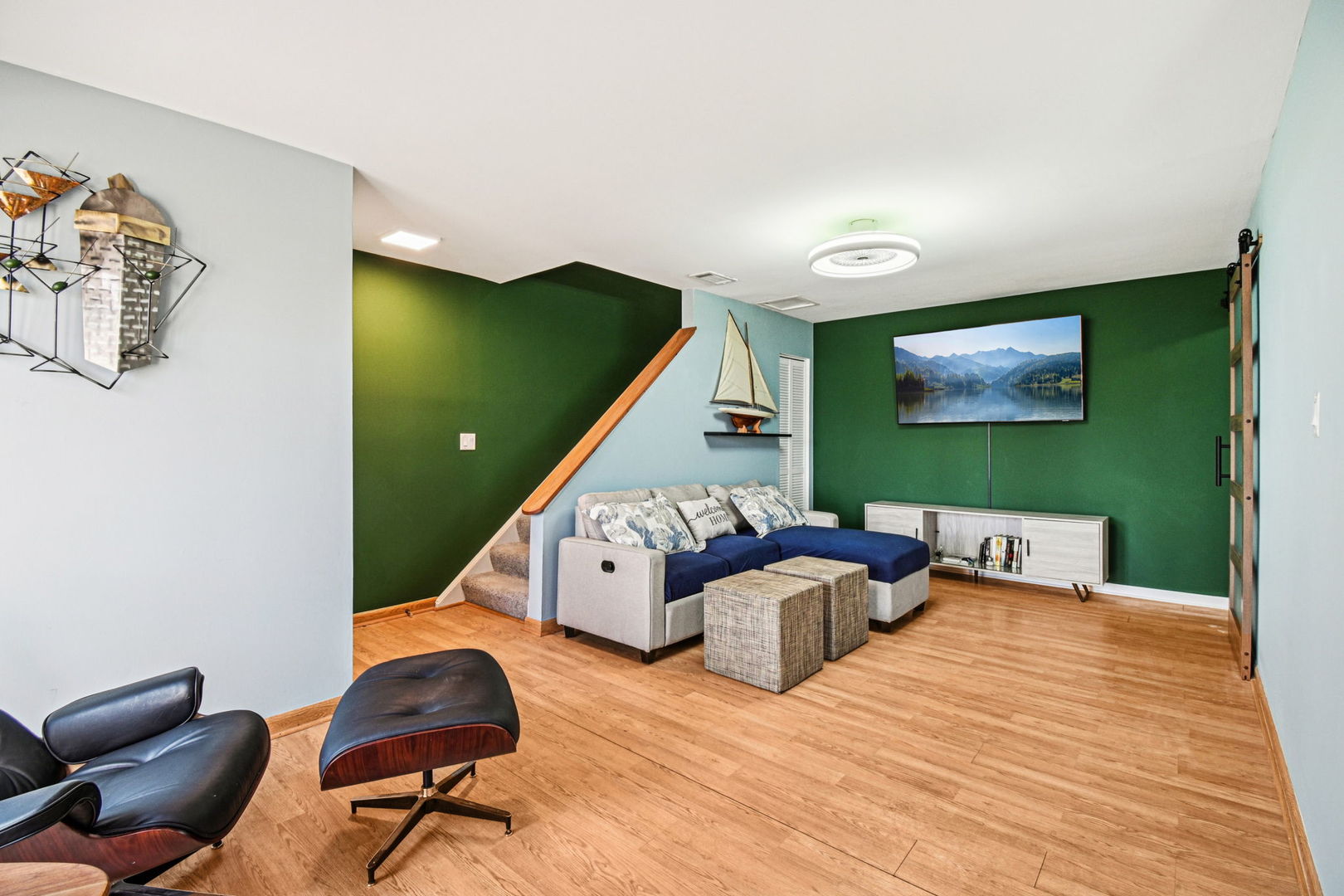 67 Woodhills Bay Road Fox Lake, IL 60020 - Photo 7 of 27 a room with furniture and a wooden floor