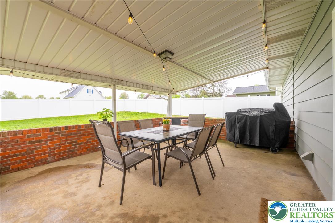 677 English Road Bath, PA 18014 - Photo 23 of 26 a view of an outdoor space with furniture and umbrella