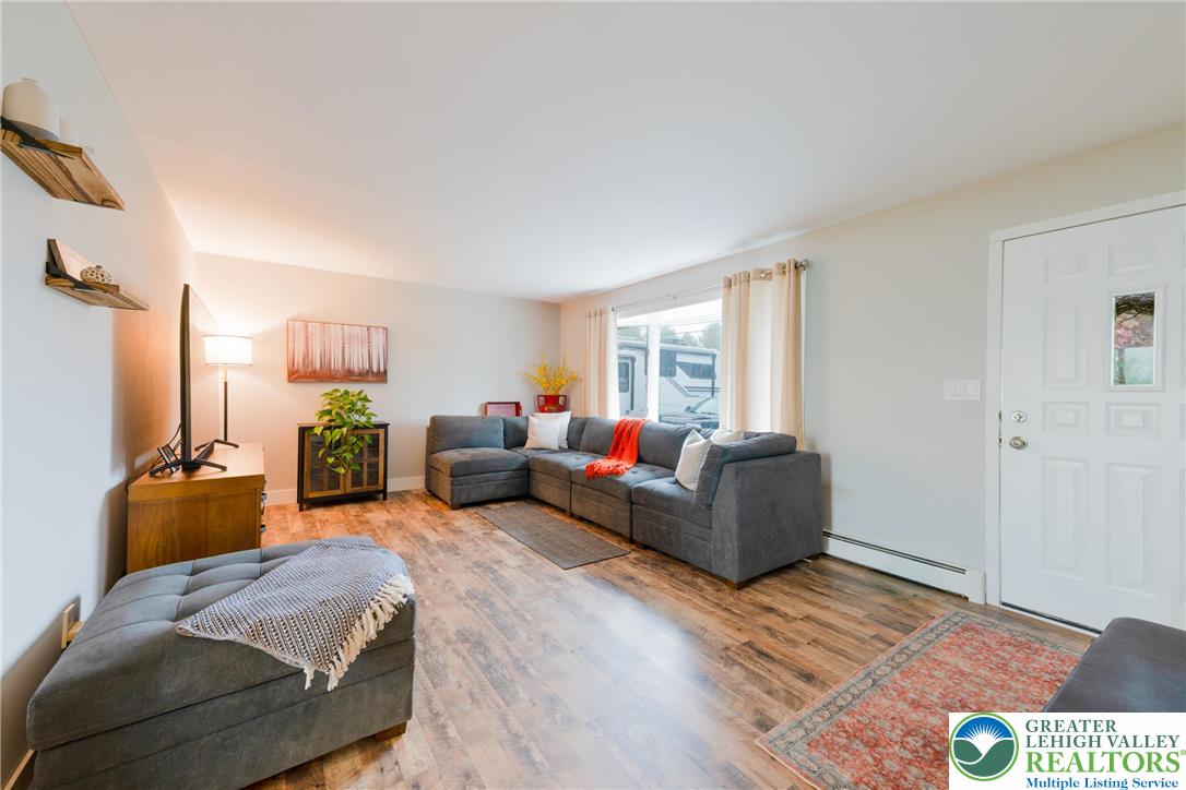 677 English Road Bath, PA 18014 - Photo 6 of 26 a living room with furniture window and wooden floor