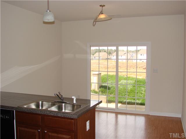 This photo is representation of a finished unit identical floor plan but not the subject property .