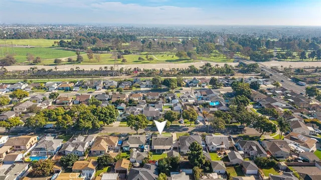 an aerial view of a city with lots of residential buildings