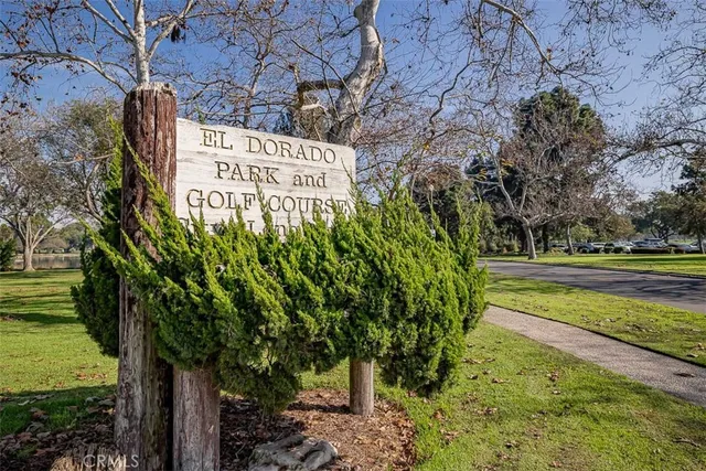 a sign that is on a brick wall