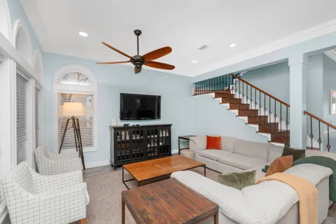 a large kitchen with a table and chairs in it