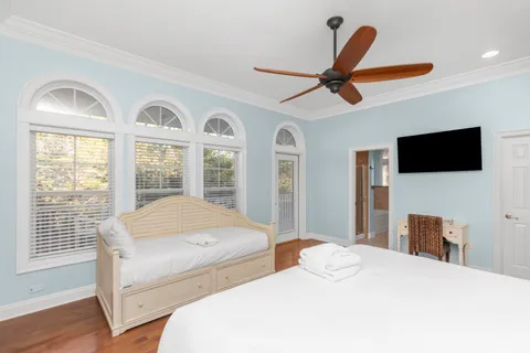 a kitchen with granite countertop cabinets sink and window