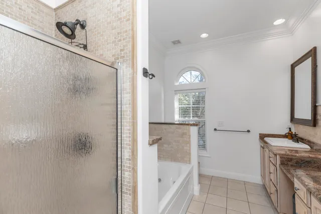 a kitchen with stainless steel appliances granite countertop a sink and cabinets
