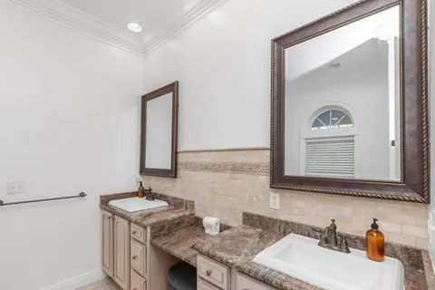 a view of a hallway with washer and dryer